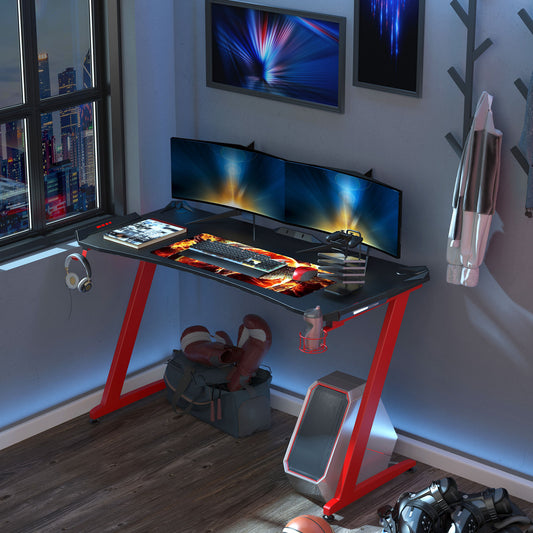 HOMCOM Computer and Gaming Desk,  142cm Width Large Tabletop with Cup Holder, Headphone Hook, Gamepad Holder 